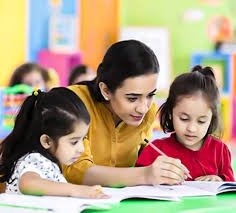 Teacher supporting a student